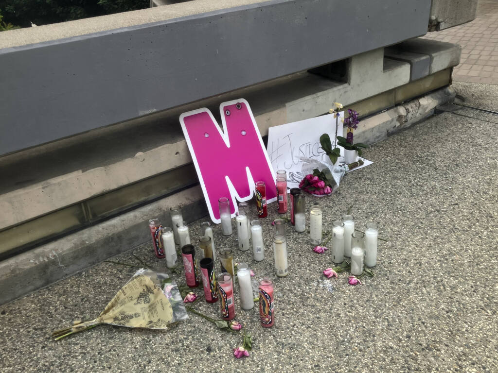 A street-side memorial for Maleesa Mooney, who was killed in her apartment, is displayed on Sept. 20, 2023, in downtown Los Angeles. 