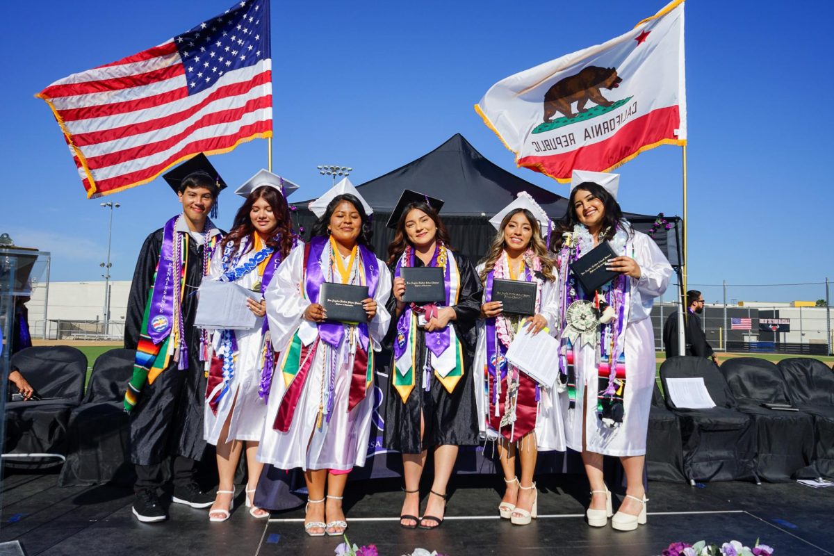 ELARA Class of 2024 Seniors Anthony Garcia, Kailee Freyre, Alejandra Diaz, Marilyn Velazquez, Jisselle Soriano, Kalee Hernandez (pictured left to right) after the graduation ceremony on Jun. 11, 2024. 